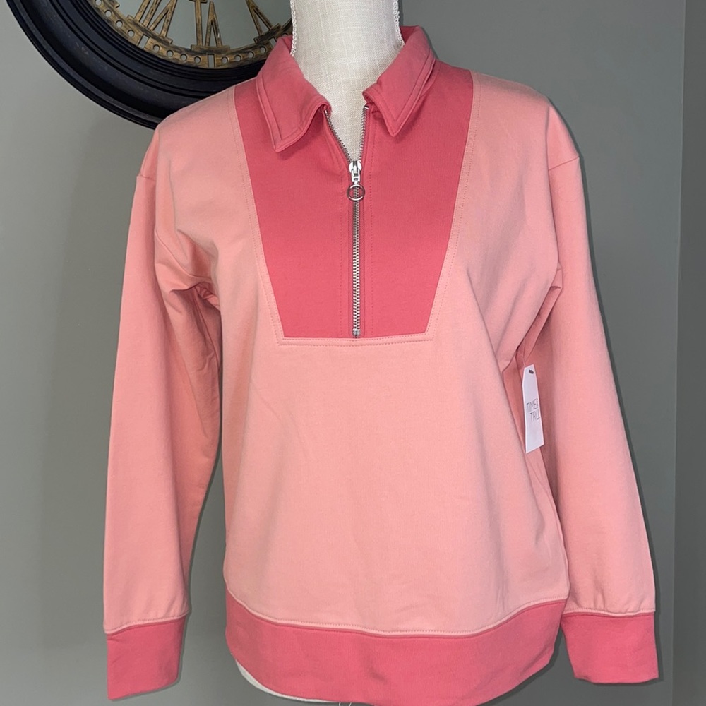 NWT women’s 1/4 zip pullover in a pretty coral and peach color.